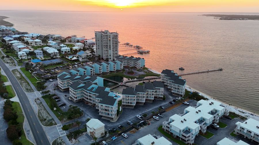 Aerial perspective of the turquoise buildings and waterfront