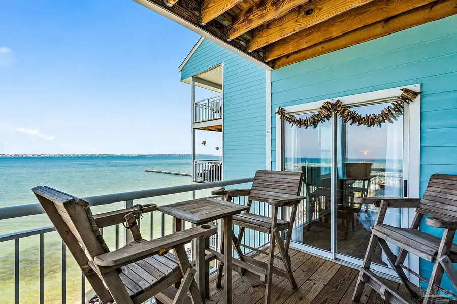 Private balcony overlooking the bay at sunset